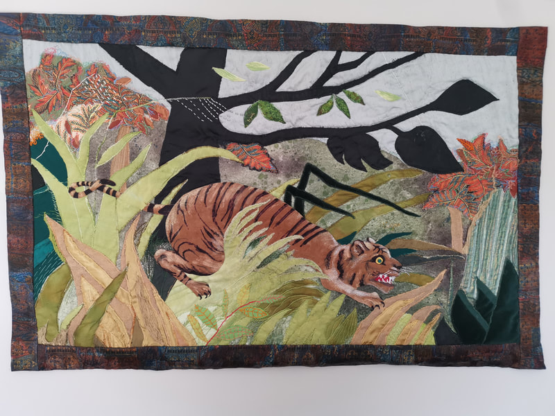 During the covid lockdowns, many C&TA members took up their
needles and sewing machines. Like many, I had time to rediscover the
joys of sewing again. The collage, inspired by Henri Rousseau’s 1891
oil painting Surprised! (Tiger in a Tropical Storm), in the National
Gallery, was a long unfinished project which took on a new
significance in uncertain times.
Through the C&TA, I discovered the tradition of women wearing pockets,
before handbags became the norm. These pockets were often beautifully
embroidered and treasured pieces of a woman’s wardrobe, keeping their
most precious possessions safe. I made several and find them very
handy to use while crafting. The hand-embroidered piece is a personal
representation of my life in lockdown; the swallows represent hope.
The sea-inspired machine-embroideries (Crashing Waves and the
waistcoat) are earlier pieces. They seem appropriate to show as part of
the C&TA’s Coral Anniversary celebrations.
Caroline Whiting, C&TA Chair